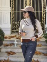 پلیور یقه اسکی زنانه با بافت کرم و جزئیات قهوهای، مناسب سایز ۳۶ تا ۴۲، قابل خرید در ۴ قسط با اسنپپی. جنس با کیفیت و طراحی شیک برای استایل پاییزی.