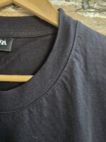 تیشرت مشکی مردانه، تیشرت نخ پنبهای، تیشرت مردانه نخ پنبه، تیشرت Stop War، تیشرت طرحدار مردانه، لباس با پیام اجتماعی، تیشرت خیابانی مردانه، تیشرت اسپرت مشکی، تیشرت راحتی مردانه، تیشرت با چاپ سفید، تیشرت با پیام ضد جنگ، تیشرت مردانه ساده، تیشرت پنبهای مشکی، خرید تیشرت مشکی مردانه، خرید اقساطی لباس مردانه، خرید با اسنپپی، تیشرت فری سایز، تیشرت مینیمال، پوشاک مردانه مدرن، تیشرت جدید مردانه